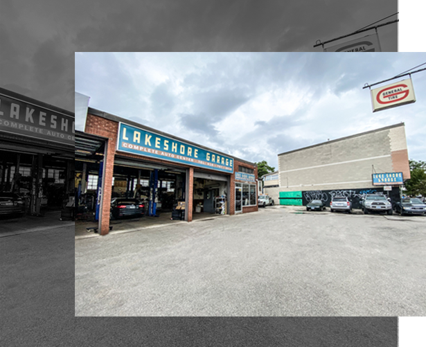 the storefront of lakeshore garage is shown with three vehicle bays